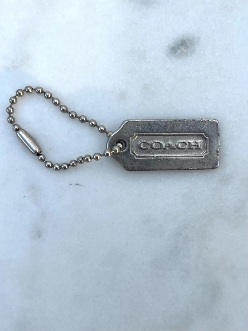 COACH Vintage Metal Hang Tag, Silver Mini